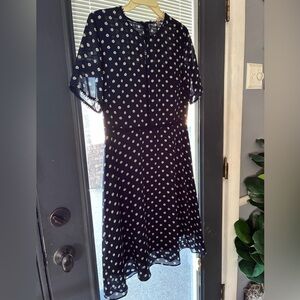 Navy dress with adorable white & green daisies. Beautiful detail and fully lined